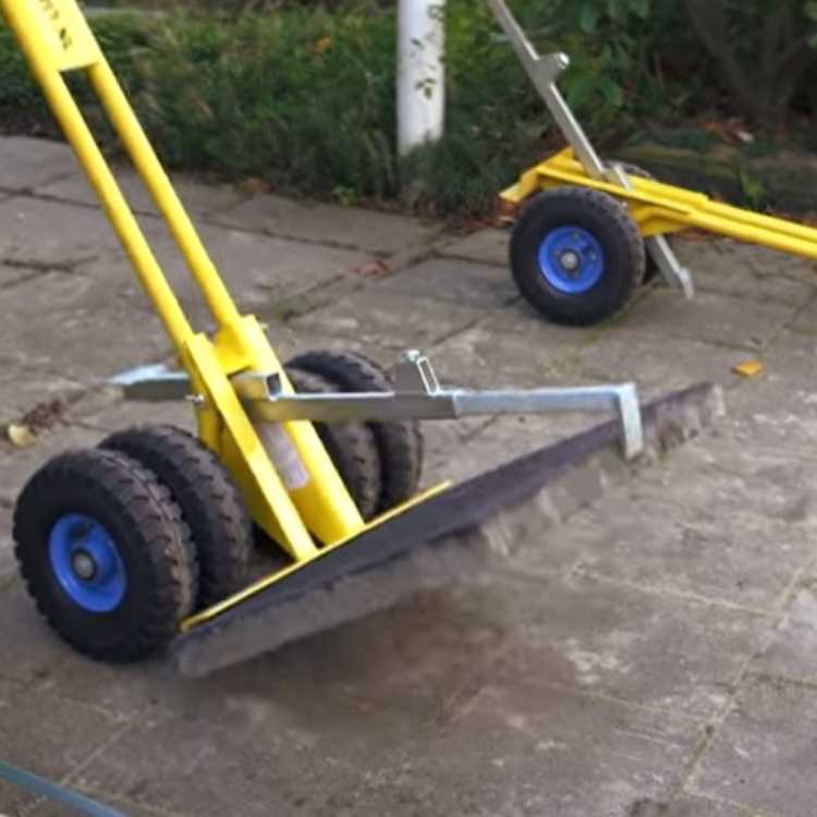Hellulyfta á 4 hjólum notuð við hellulögn