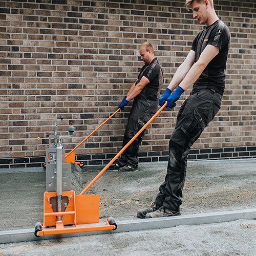 Sandhefill sléttar yfirborð fyrir lögn á gangstétt