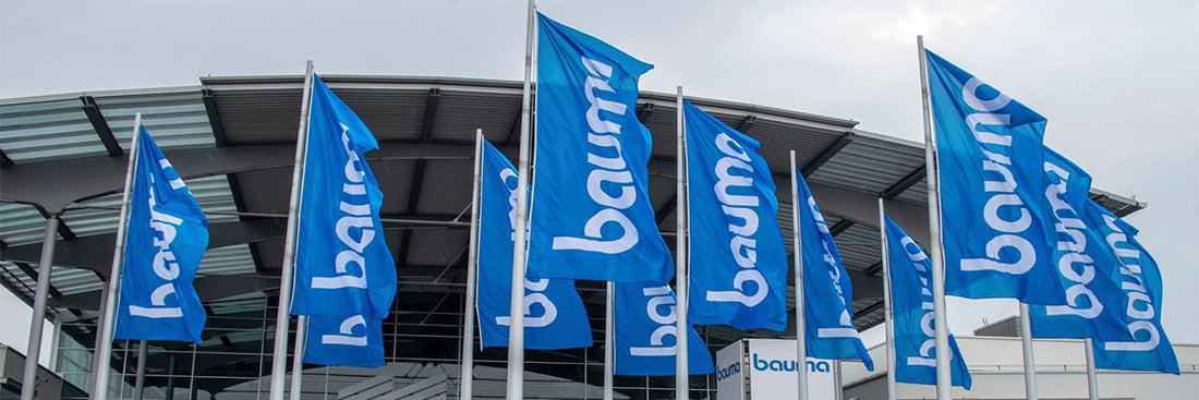 Starfsmenn á véla- og tækjasýningu BAUMA 2025