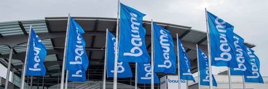 Starfsmenn á véla- og tækjasýningu BAUMA 2025